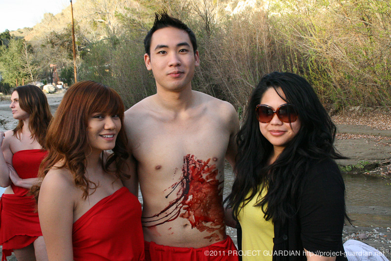 Posing for photos between takes
