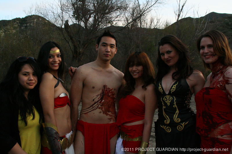 Posing for photos between takes